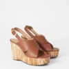 Sandali con zeppa in pelle