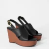 Sandali con zeppa in pelle