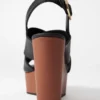 Sandali con zeppa in pelle