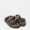 Sandali in pelle con cinturini incrociati