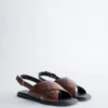 Sandali in pelle con cinturini incrociati