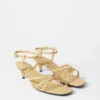 Sandali in pelle con tacco decorati