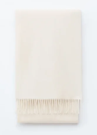 Sciarpa-coperta in lana con frange