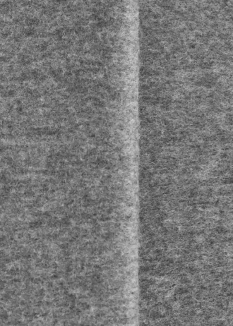 Sciarpa-coperta in lana con frange