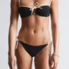 Slip bikini con lacci laterali