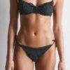 Slip bikini con lacci laterali