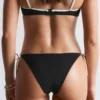 Slip bikini con lacci laterali