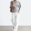 T-shirt con scollo a V arricciato