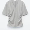 T-shirt con scollo a V arricciato