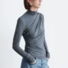 Top a collo alto drappeggiato