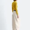 Top a collo alto drappeggiato