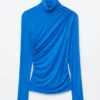 Top a collo alto drappeggiato