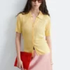 Top a maglia a coste