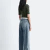 Top a maniche corte con collo alto