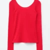 Top a maniche lunghe con scollo rotondo