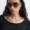 Top a maniche lunghe con scollo rotondo