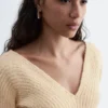 Top a V in maglia a coste