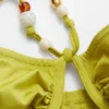 Top bikini a balconcino con perline