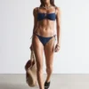Slip bikini con lacci laterali