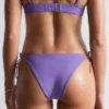 Slip bikini con lacci laterali