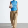 Top con collo alto arricciato