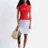 Top con scollo a barchetta smockato