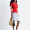 Top con scollo a barchetta smockato