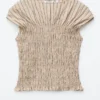 Top con scollo a barchetta smockato