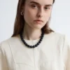 Top in cotone con peplo
