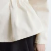Top in cotone con peplo