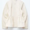 Top in cotone con peplo