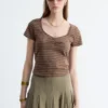 Top in jersey con ruches sul busto