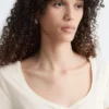 Top in jersey con ruches sul busto