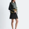 Top in pelle con spalle arricciate