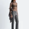 Top in pizzo a maniche lunghe