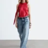 Top in seta con scollo a sciarpa
