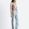 Top in seta con scollo a sciarpa