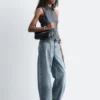 Top smanicato con coulisse