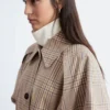 Trench con cintura a fibbia a quadri
