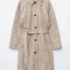 Trench con cintura a fibbia a quadri
